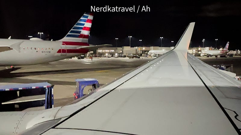 an airplane wing at an airport