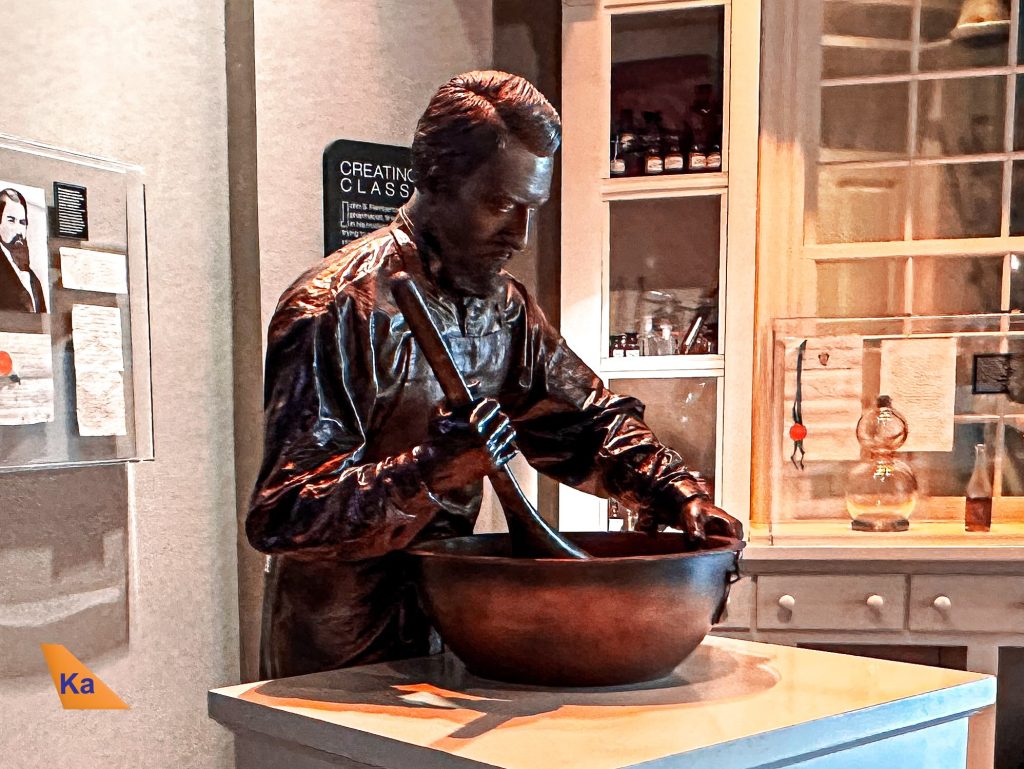 a statue of a man mixing food in a bowl