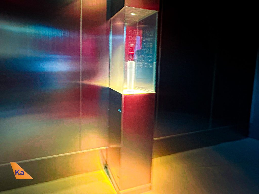 a glass box with a light inside