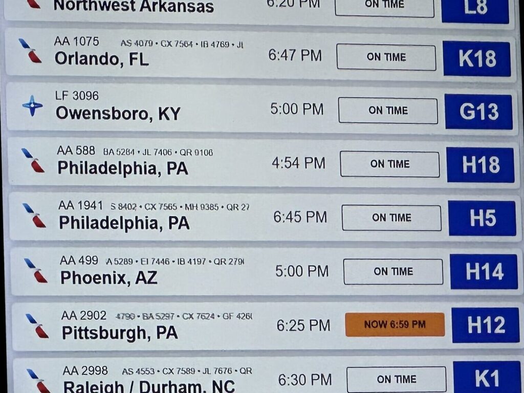 a close up of a flight schedule