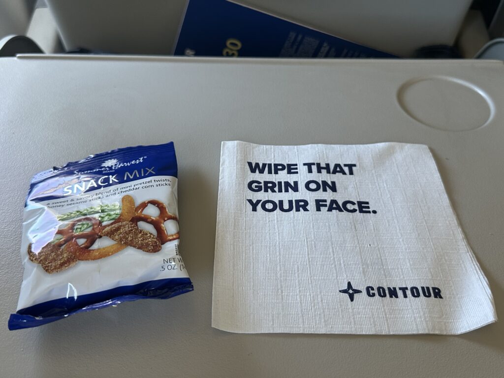 a napkin and a bag of pretzels