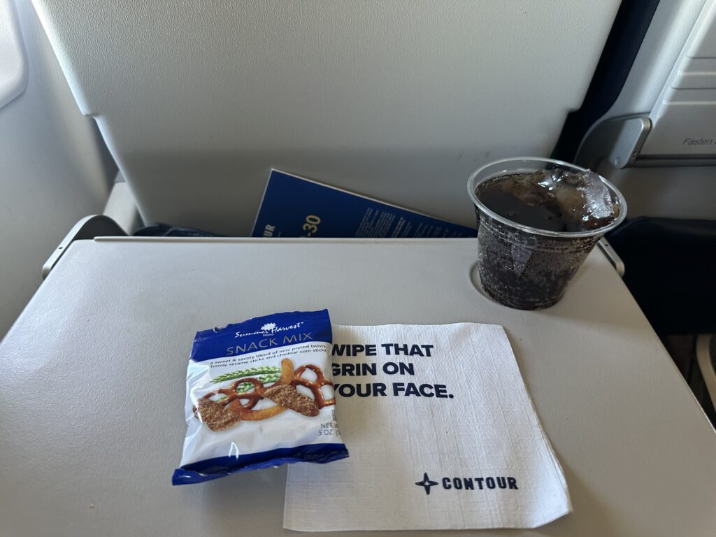 a napkin and a drink on a table