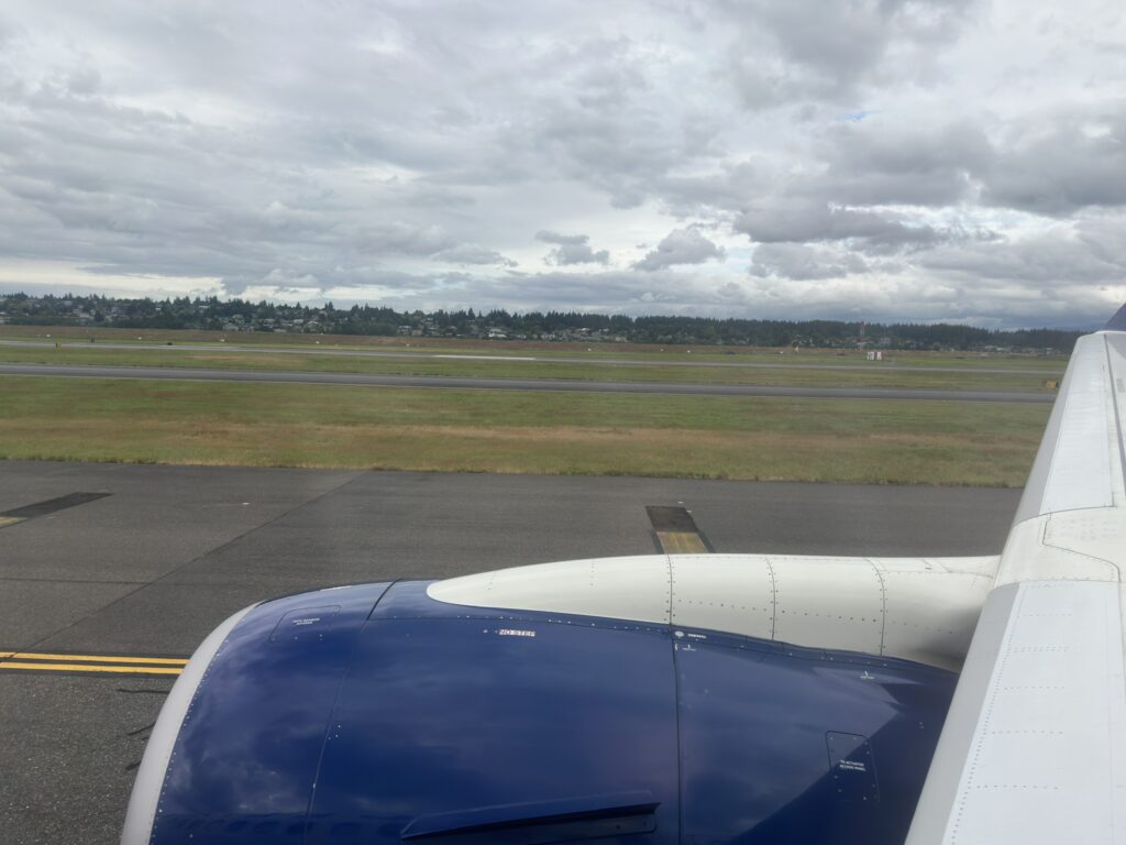 an airplane wing on a runway