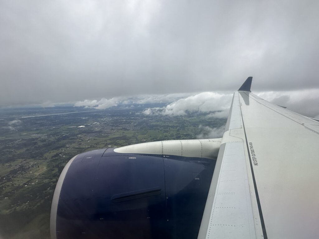 an airplane wing and the sky