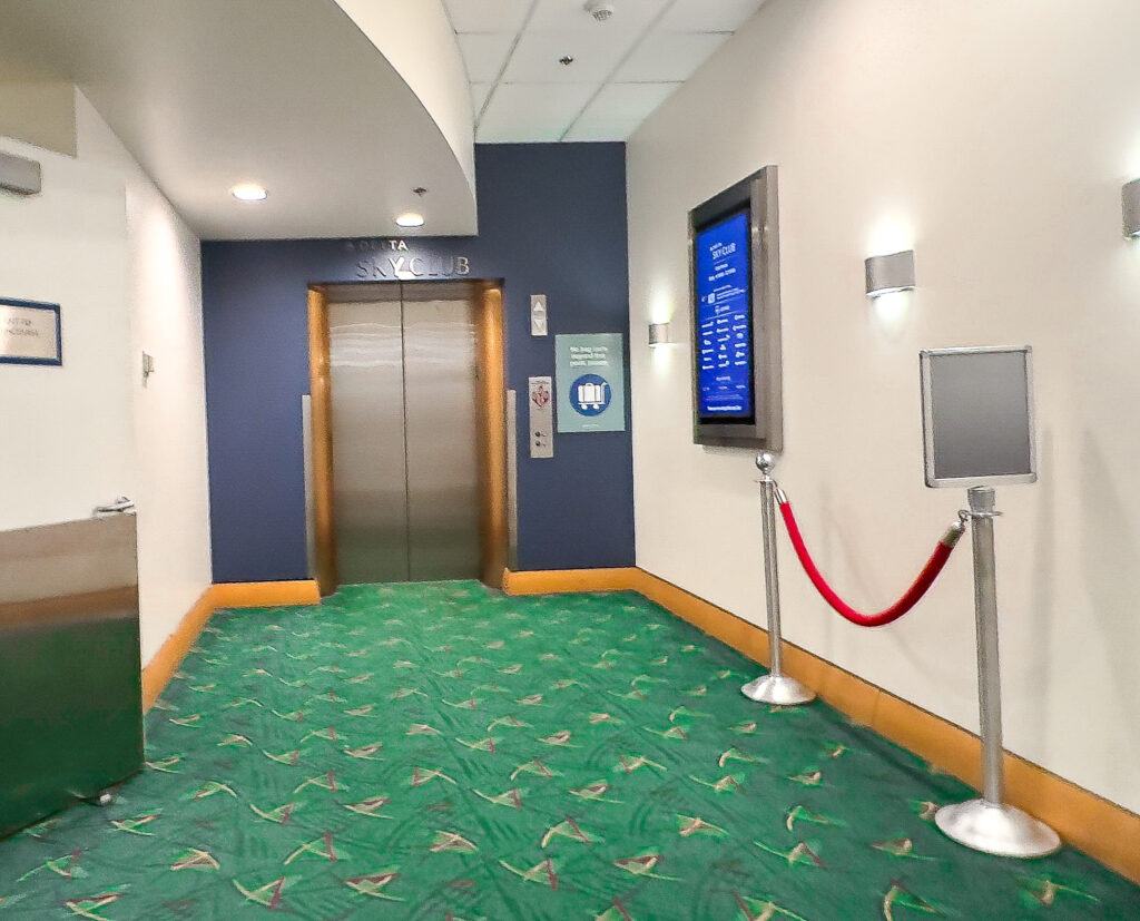 a elevator with a rope barrier