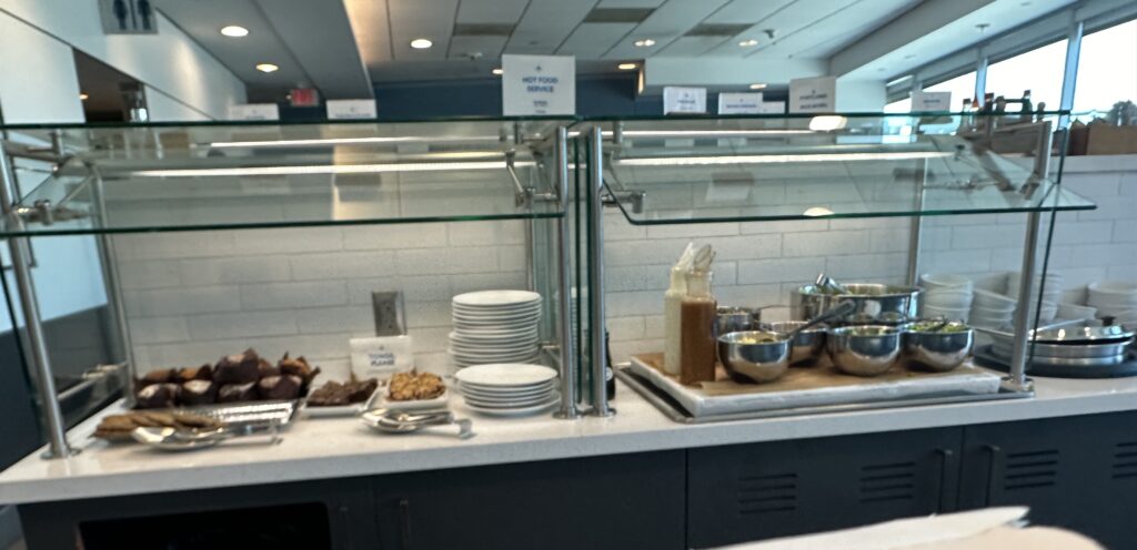 a counter with plates and bowls on it