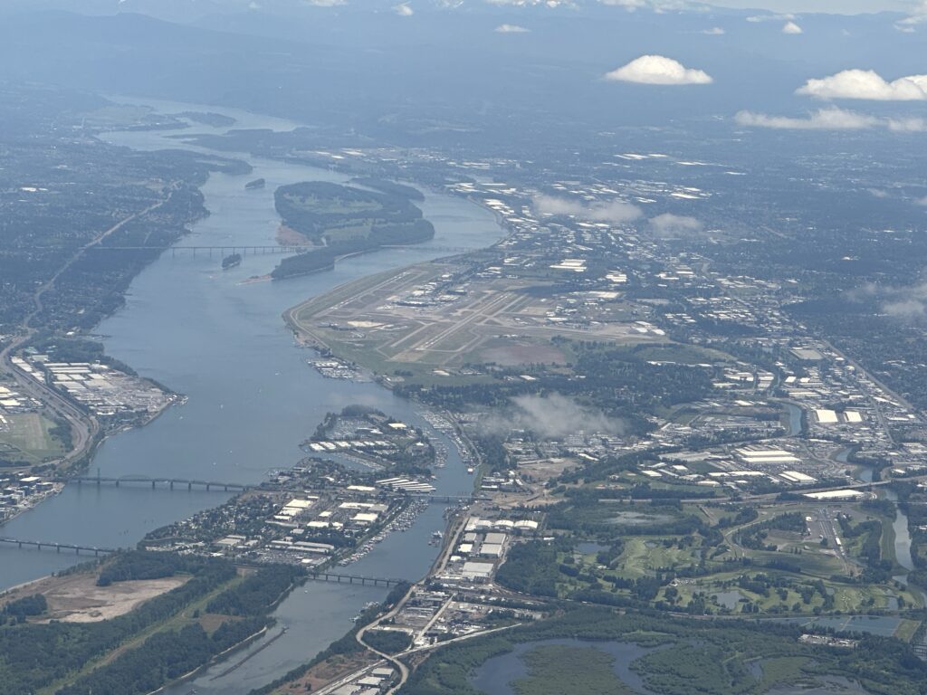 an aerial view of a city and a river