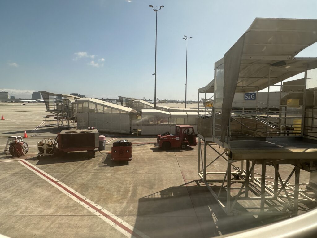 a group of vehicles parked at an airport