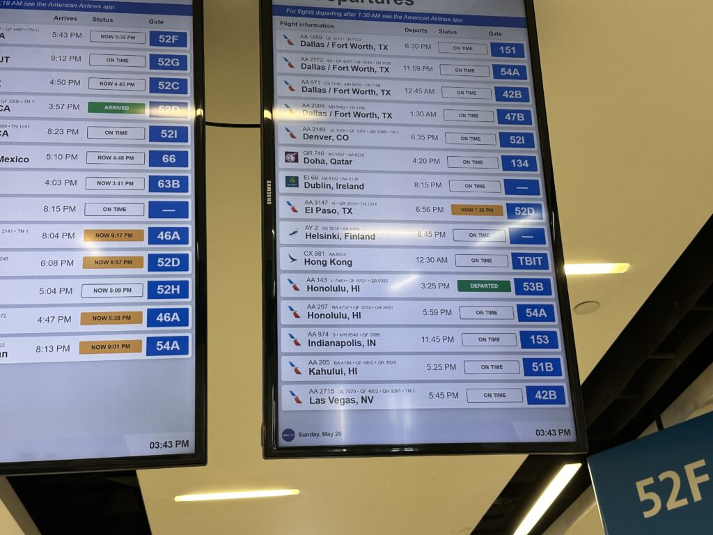 a sign with a list of flights