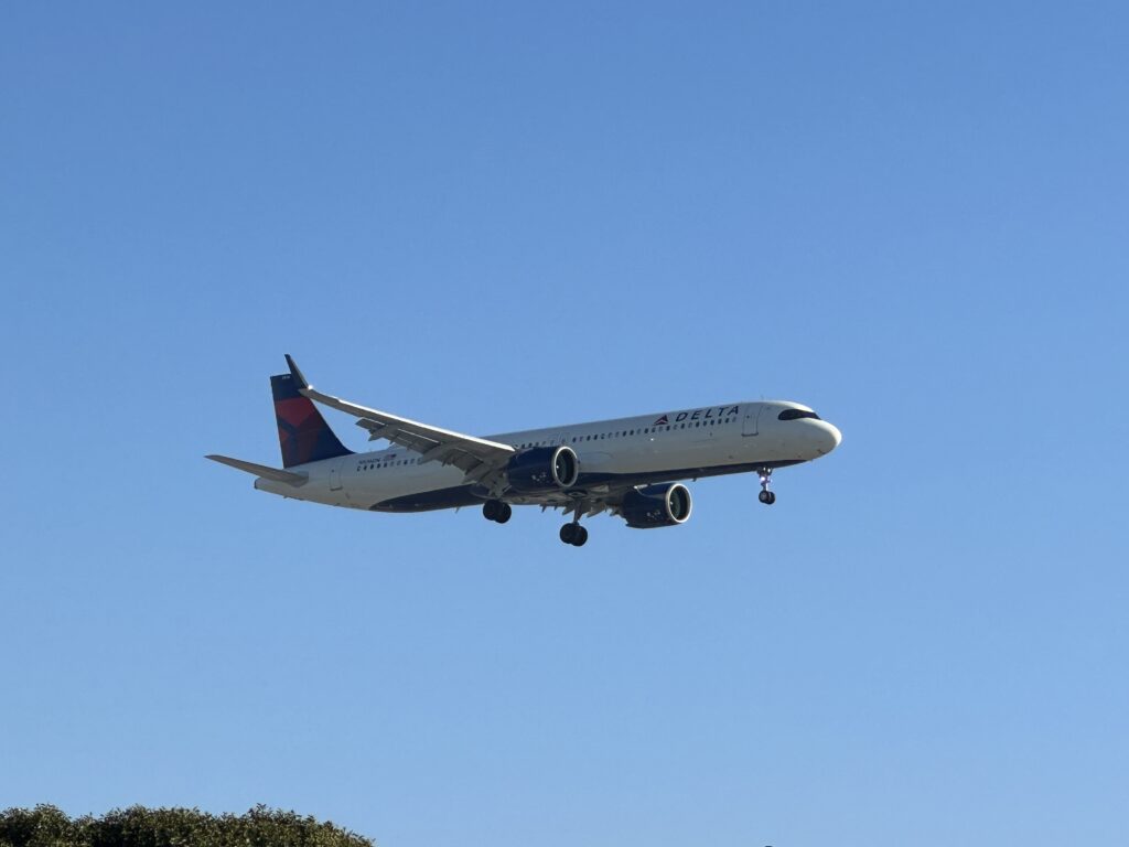 a plane flying in the sky