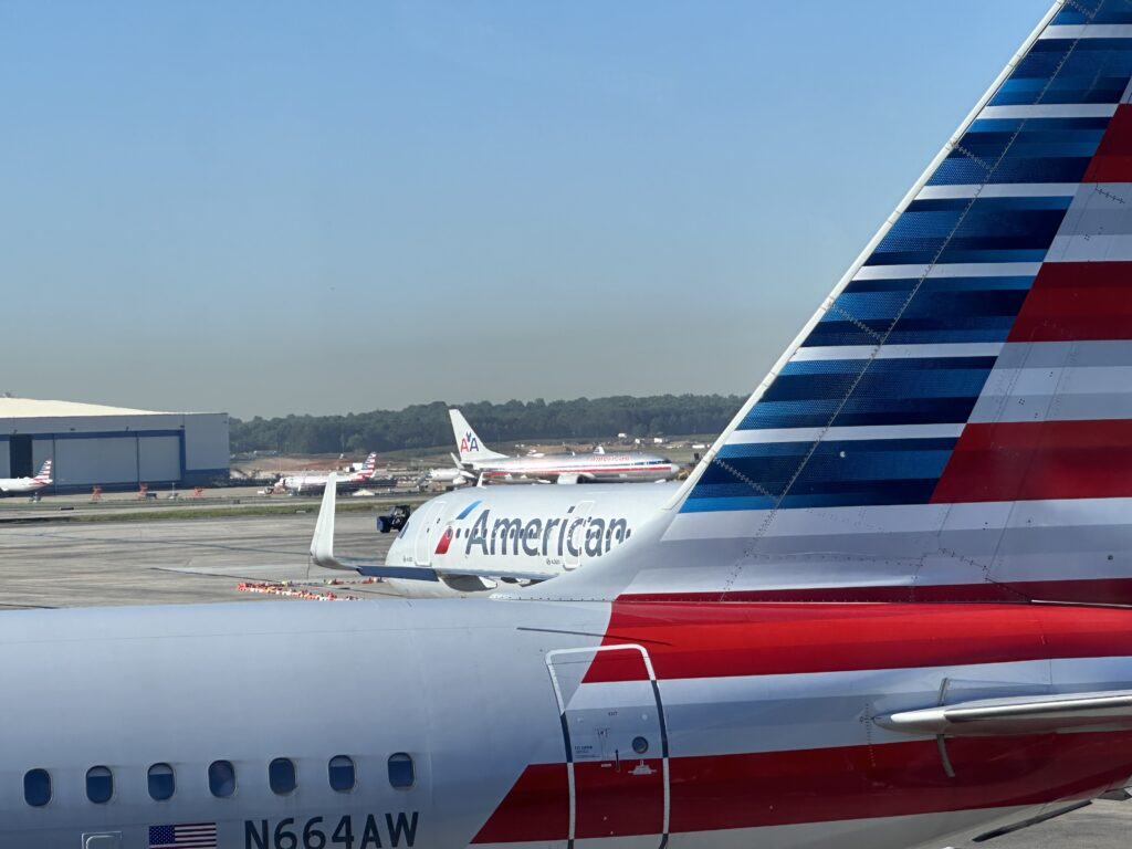 airplanes parked on a runway