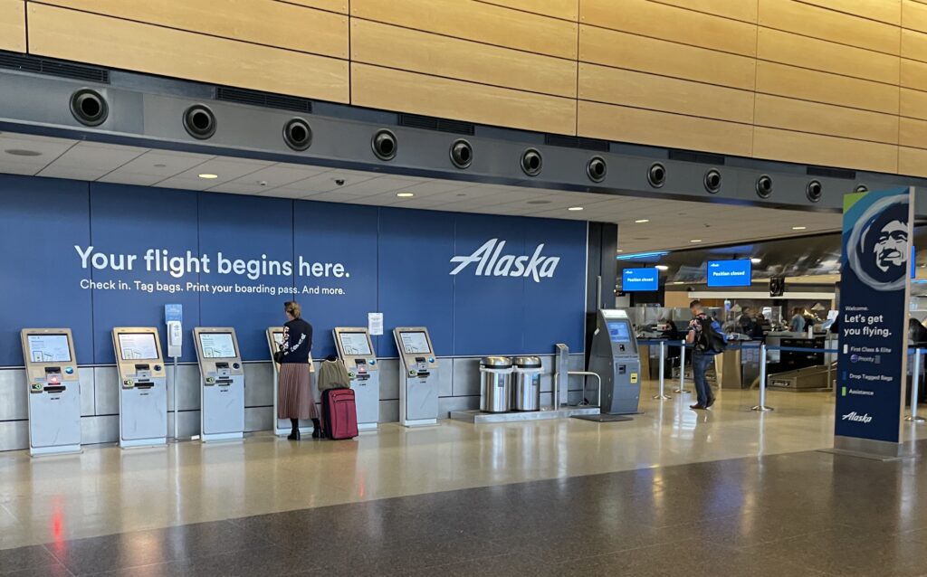 people standing in a terminal