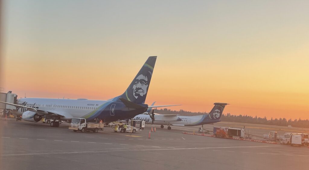 airplanes parked at an airport