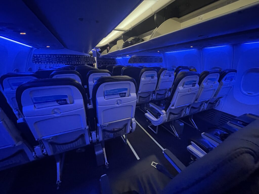 an airplane with blue lights