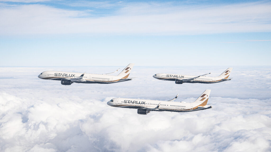 a group of airplanes flying in the sky